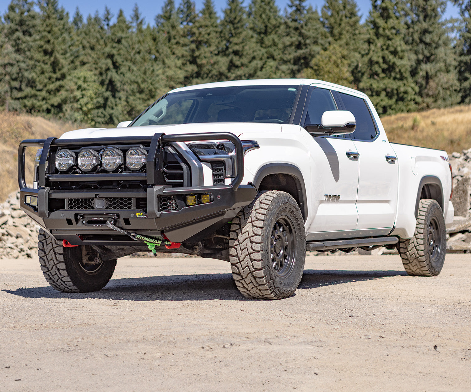 Truck equipped with an Ironman 4x4 suspension lift kit for improved clearance on off road trails.
